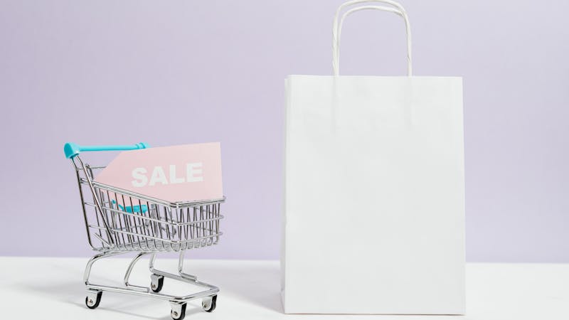 Shoppers walking through a retail store, reflecting consumer spending trends